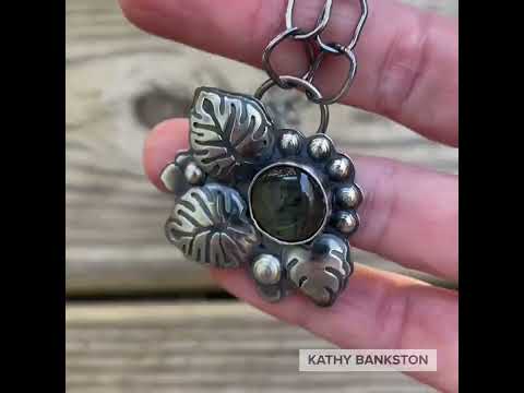 Load and play video in Gallery viewer, Labradorite Monstera Leaf Necklace in Sterling Silver
