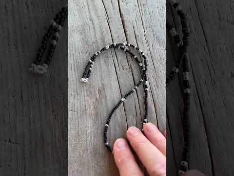 
                      
                        Load and play video in Gallery viewer, Black and Silver Seed Bead Necklace
                      
                    