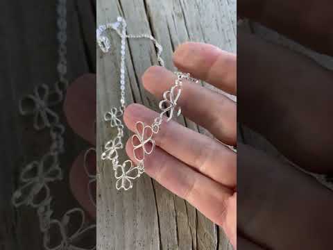 
                      
                        Load and play video in Gallery viewer, Petals in the Wind Necklace - Delicate Sterling Silver Flower Necklace
                      
                    