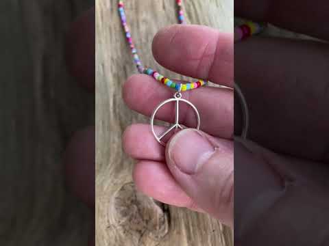 
                      
                        Load and play video in Gallery viewer, Peace Sign Necklace with Hippie Love Beads
                      
                    