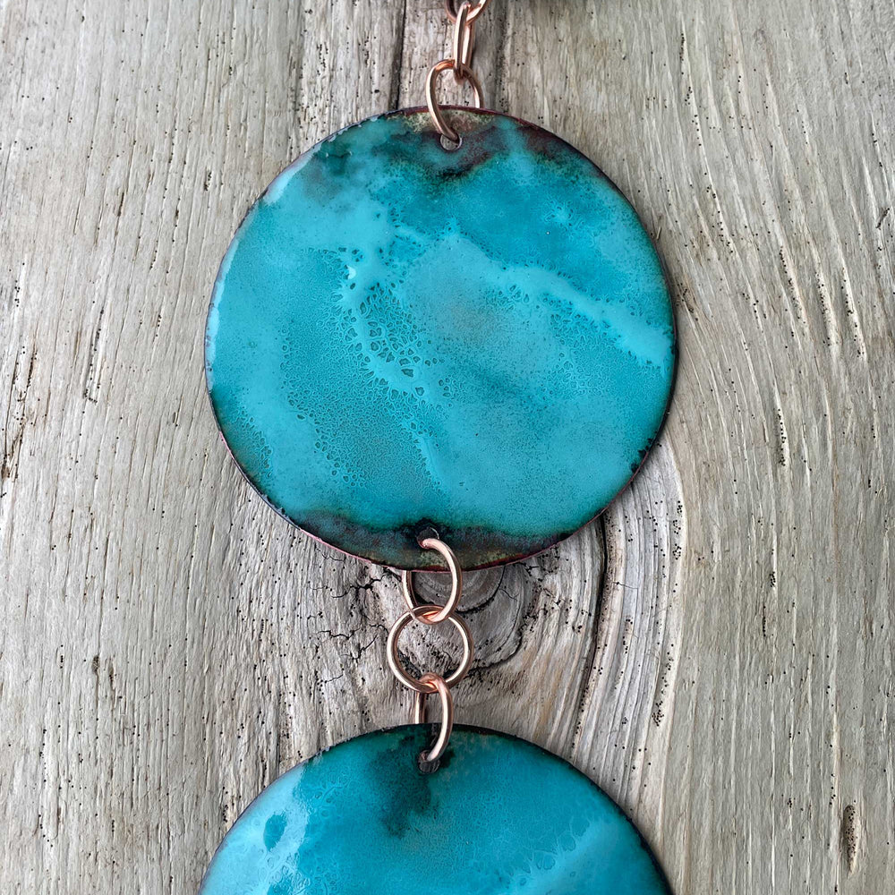 
                      
                        Hanging Copper Wind Spinner Mobile with Teal Glass Enamel
                      
                    