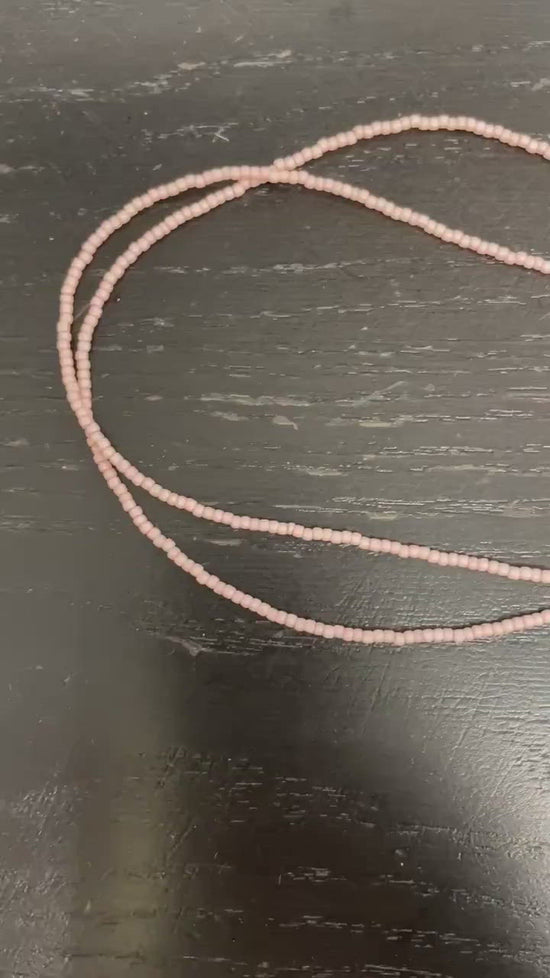 Load and play video in Gallery viewer, Pastel Pink Single Strand Seed Bead Necklace, Tiny 2.2mm Opaque Pale Pink Beaded Necklace, Made to Order Choker to Long Lengths
