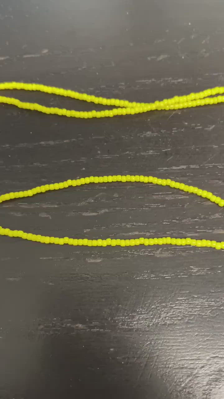 Load and play video in Gallery viewer, Yellow Single Strand Seed Bead Necklace, Tiny 2.2mm Opaque Dandelion Yellow Beaded Necklace, Made to Order Choker to Long Lengths
