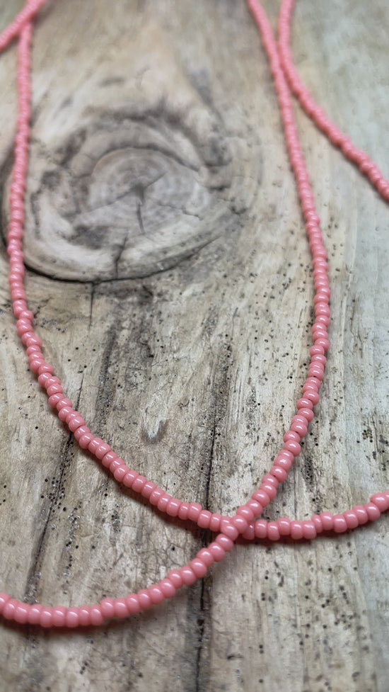 Load and play video in Gallery viewer, Salmon Pink Seed Bead Necklace, Thin 1.5mm Single Strand Necklace

