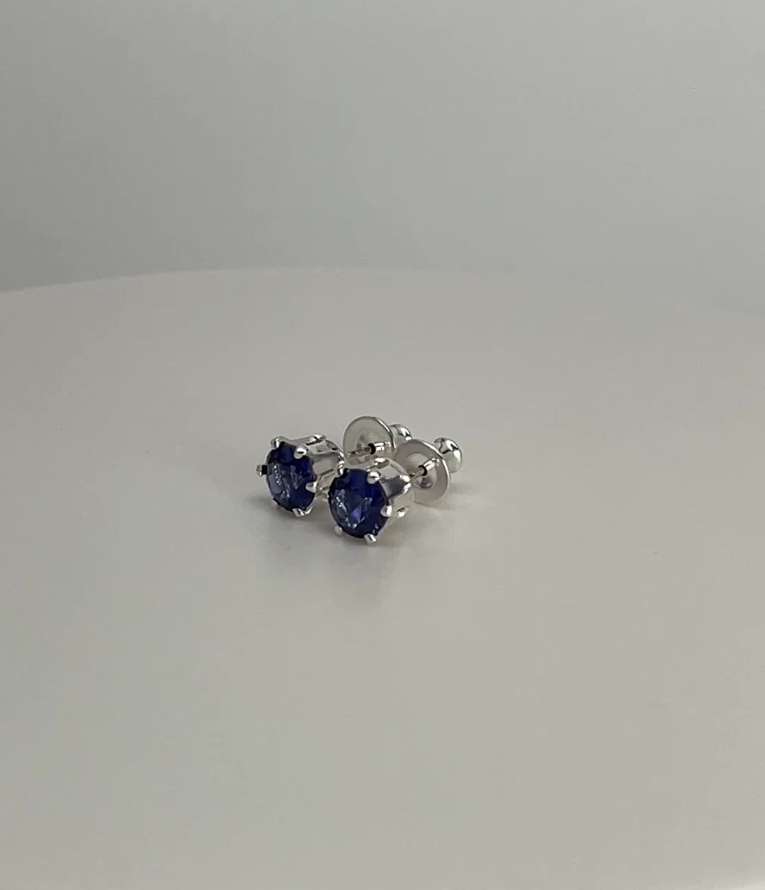 Load and play video in Gallery viewer, Tanzanite Gemstone Stud Earrings, 6mm Round Prong Set 925 Sterling Silver
