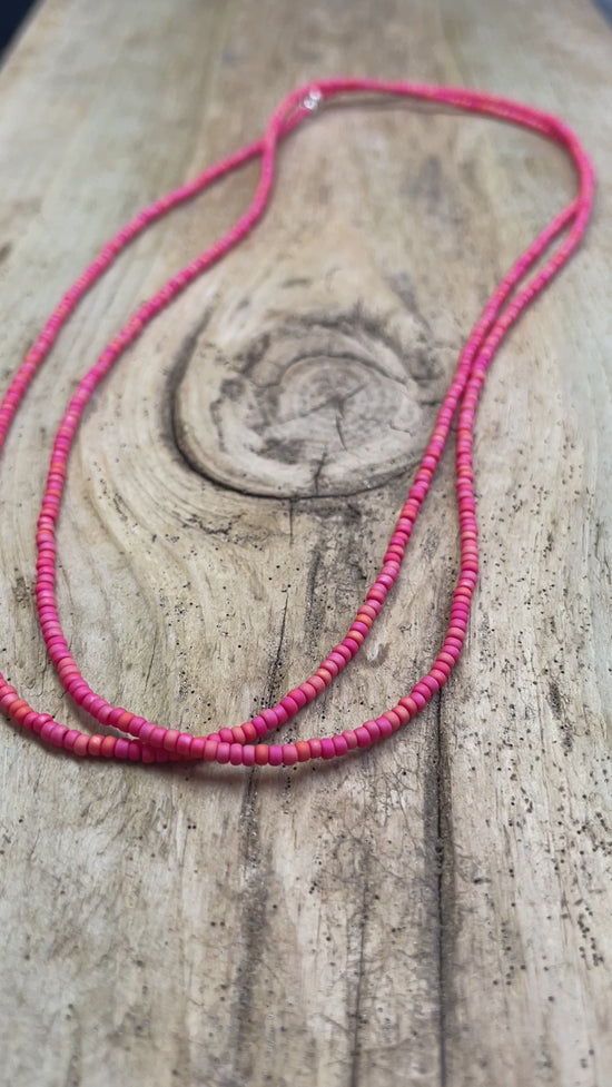 Load and play video in Gallery viewer, Coral Rainbow Seed Bead Necklace, Thin 1.5mm Single Strand Beaded Necklace
