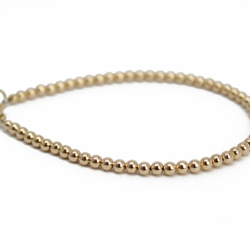 
                      
                        3mm 14K Gold Filled Bead Bracelet with Clasp
                      
                    