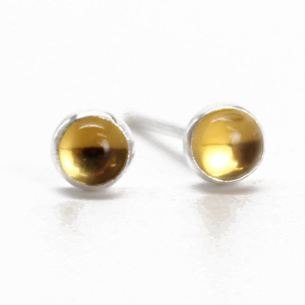 
                      
                        Citrine Stud Earrings-Tiny 3mm
                      
                    