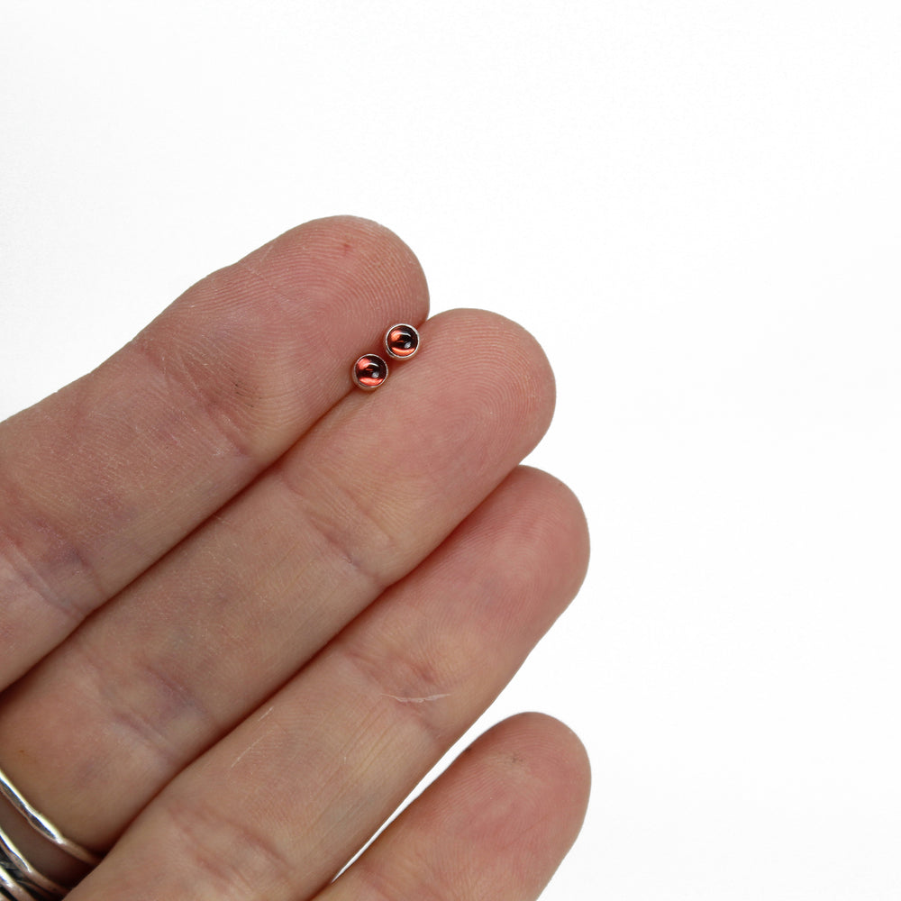 
                      
                        3mm Garnet Stud Earrings
                      
                    