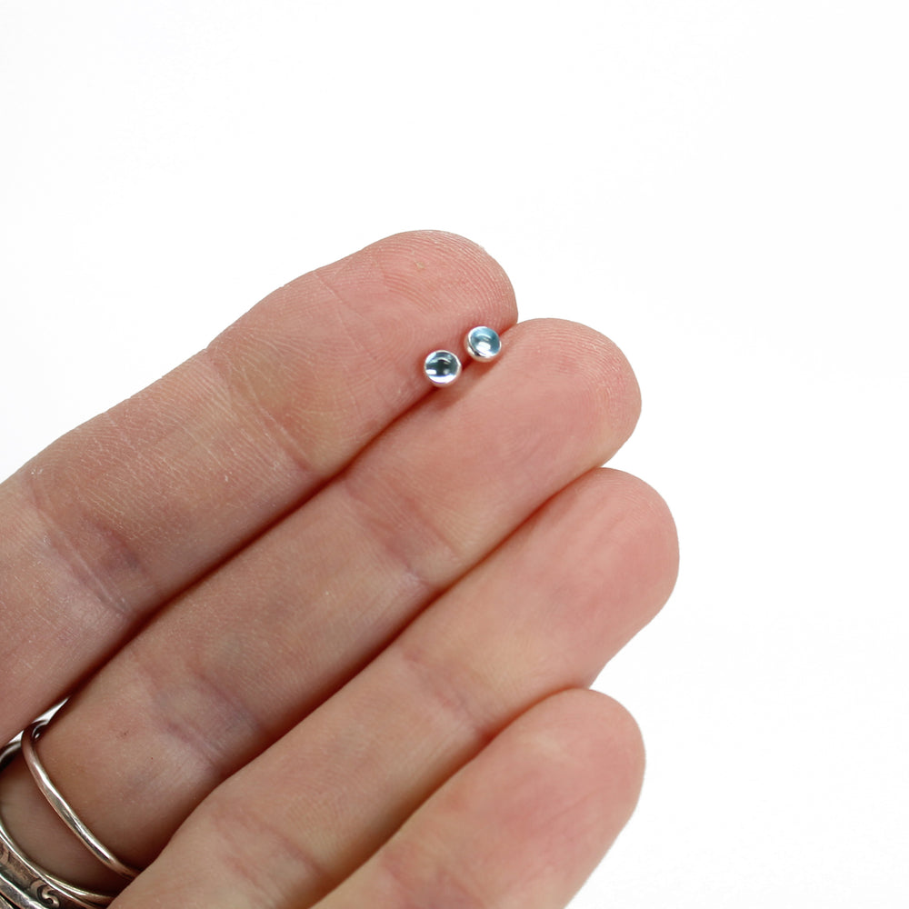 
                      
                        3mm Swiss Blue Topaz Stud Earrings
                      
                    