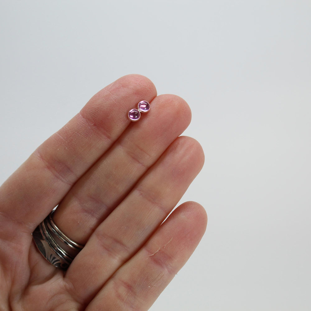 
                      
                        Pink Sapphire Stud Earrings 4mm in Sterling Silver
                      
                    