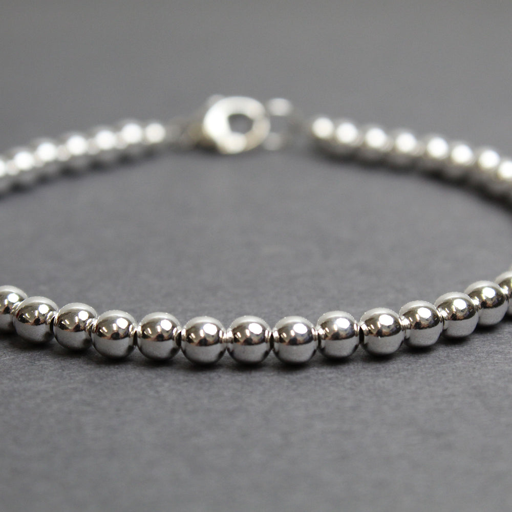 
                      
                        4mm Sterling Silver Bead Bracelet
                      
                    