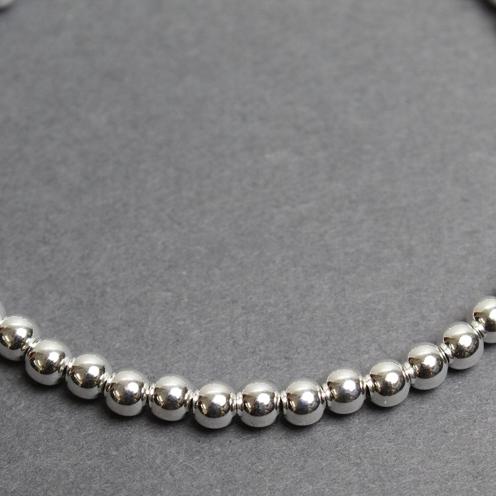 
                      
                        4mm Sterling Silver Bead Bracelet
                      
                    