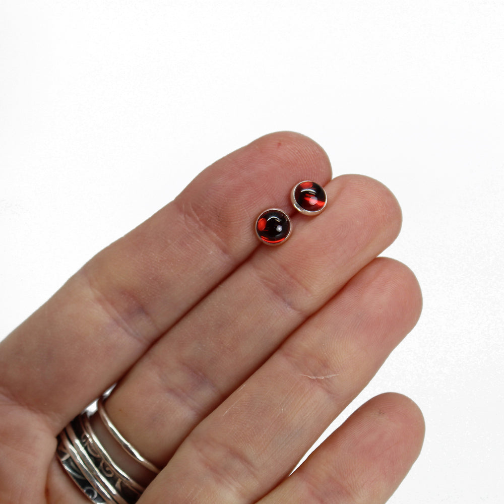 
                      
                        6mm Garnet Stud Earrings
                      
                    