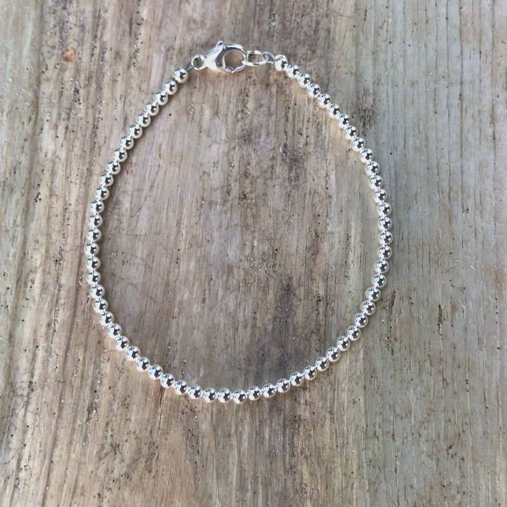 
                      
                        Load and play video in Gallery viewer, 3mm Sterling Silver Bead Bracelet
                      
                    