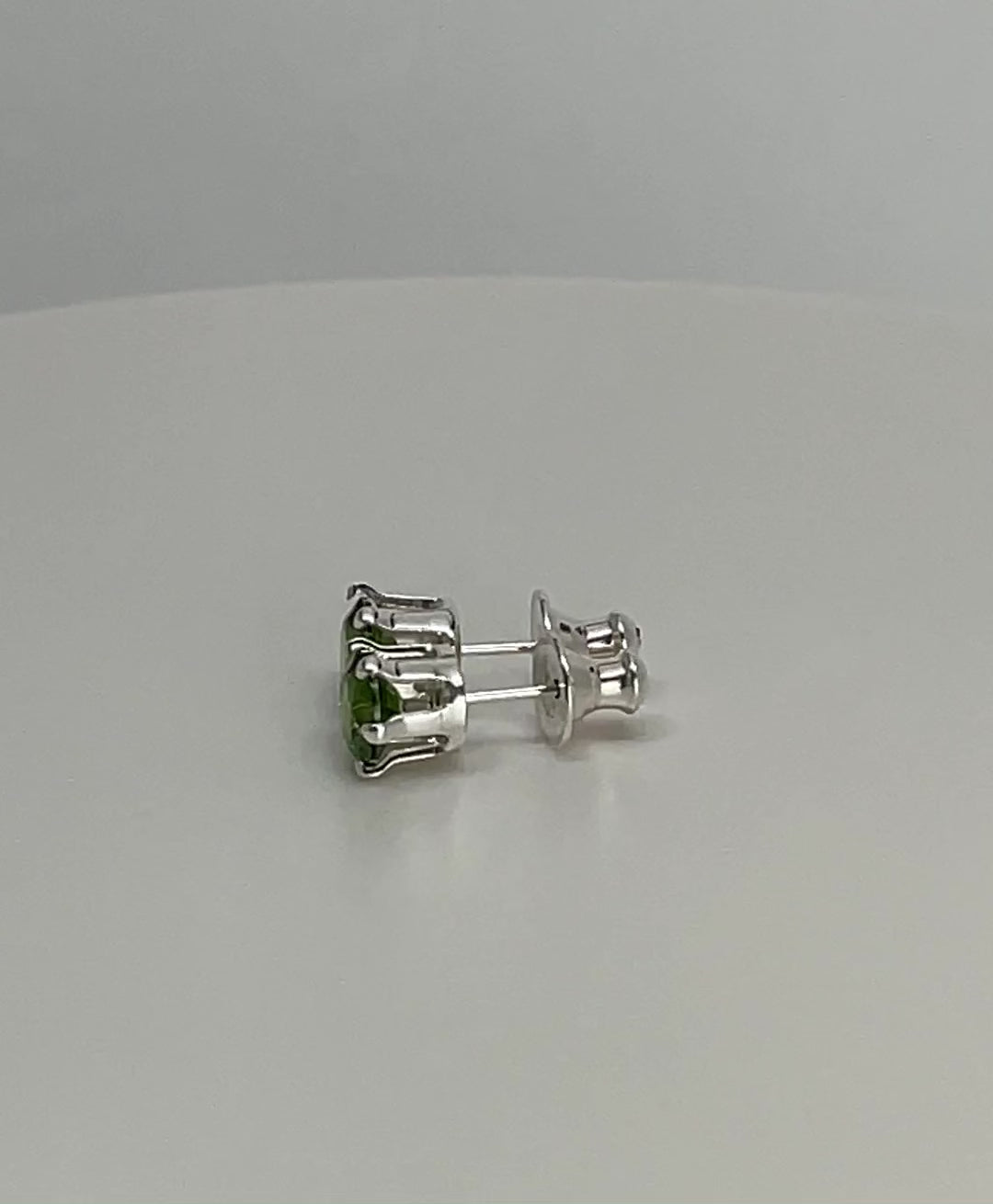 Load and play video in Gallery viewer, 6mm Prong Set Simulated Peridot Stud Earrings in Sterling Silver
