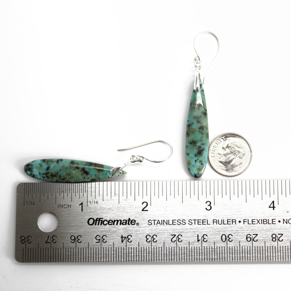 
                      
                        African Turquoise Slab Dangle Earrings
                      
                    