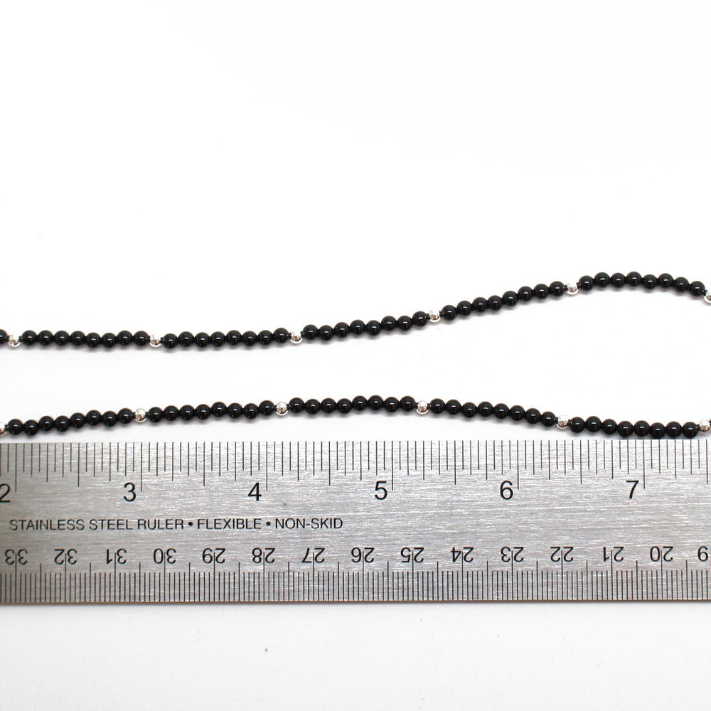 
                      
                        Black Onyx Necklace with Hand Carved Onyx Leaf
                      
                    