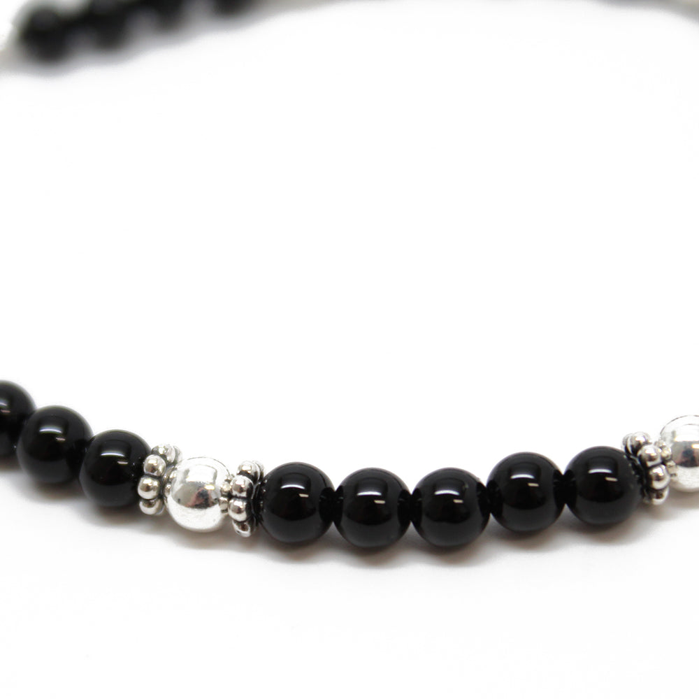 
                      
                        Black Onyx and Sterling Silver Bead Bracelet
                      
                    