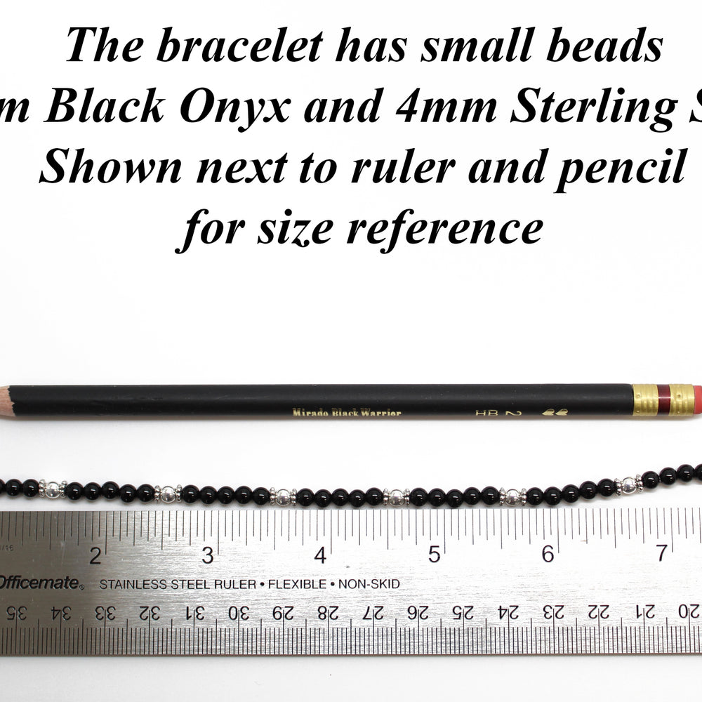 
                      
                        Black Onyx and Sterling Silver Bead Bracelet
                      
                    