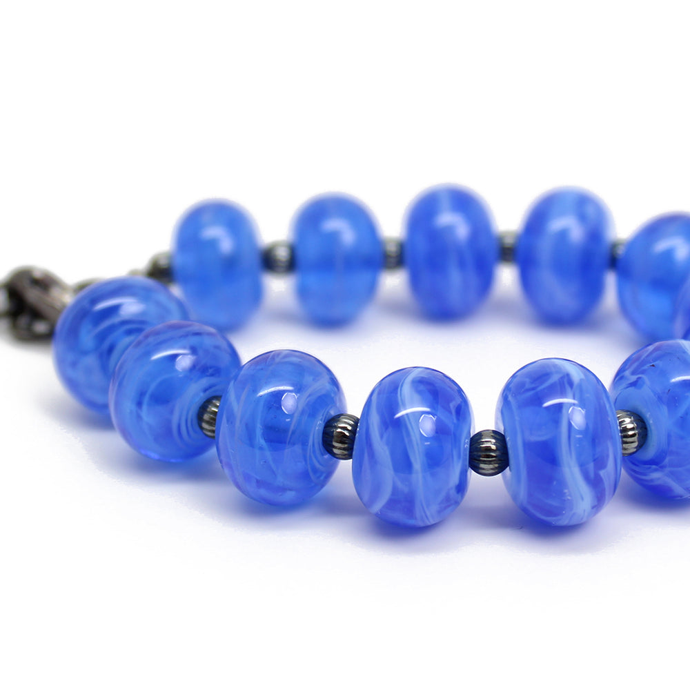 
                      
                        Blue Lampwork Bead Bracelet with Turtle Charm
                      
                    