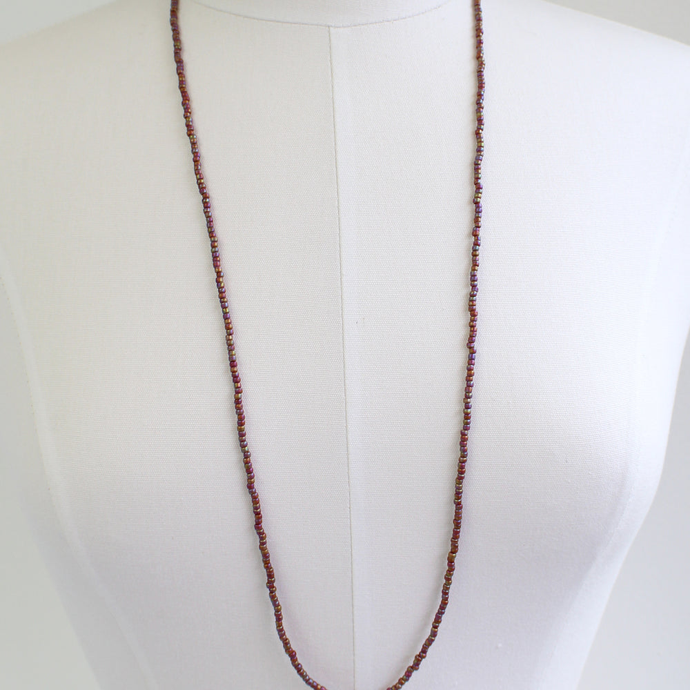 
                      
                        Burnt Orange Seed Bead Necklace
                      
                    