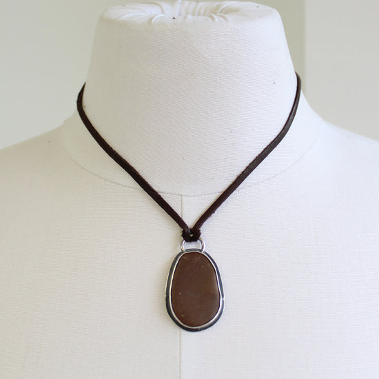 Handcrafted Brown Beach Stone Pendant in Sterling Silver with Deer Skin Lace