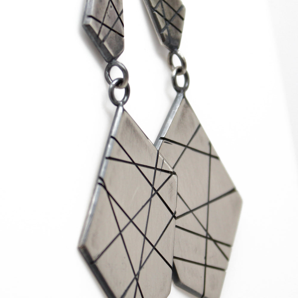 
                      
                        Modern Geometric Sterling Silver Dangle Earrings
                      
                    