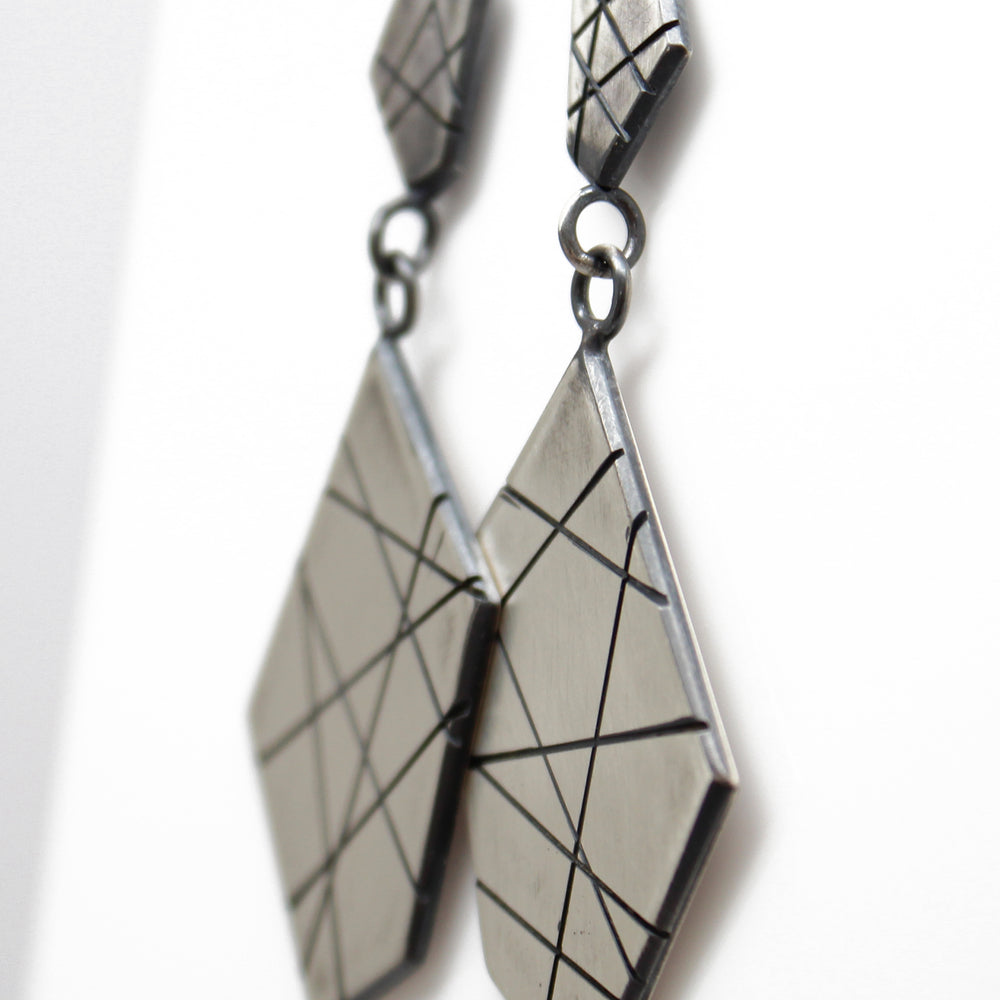 
                      
                        Modern Geometric Sterling Silver Dangle Earrings
                      
                    
