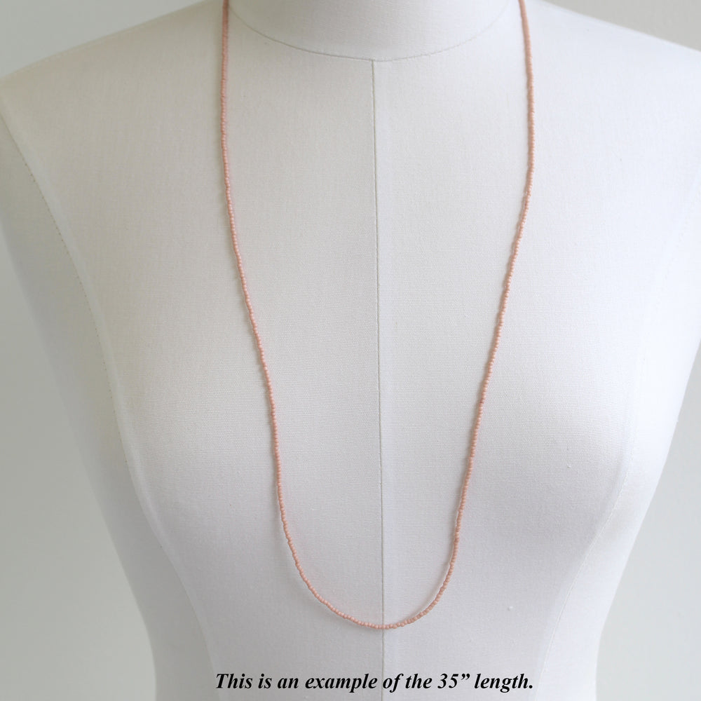 
                      
                        Pastel Pink Single Strand Seed Bead Necklace, Tiny 2.2mm Opaque Pale Pink Beaded Necklace, Made to Order Choker to Long Lengths
                      
                    