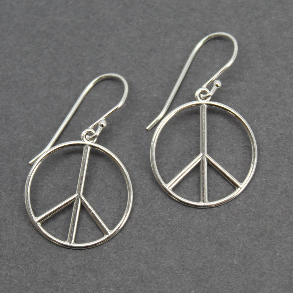 
                      
                        Peace Sign Dangle Earrings in Sterling Silver
                      
                    