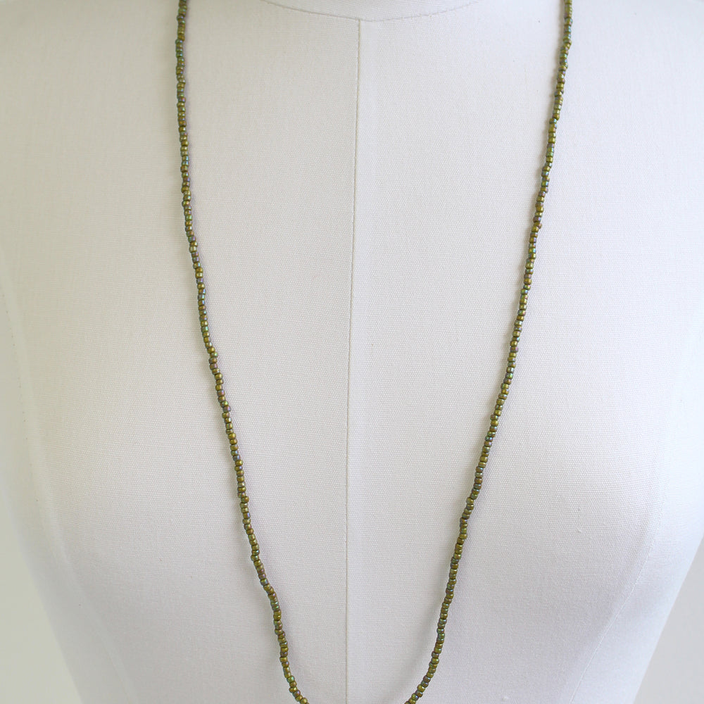 
                      
                        Long Semi Glazed Olive Green Seed Bead Necklace
                      
                    