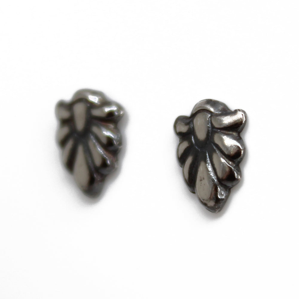 
                      
                        Sterling Silver Flourish Stud Earrings
                      
                    