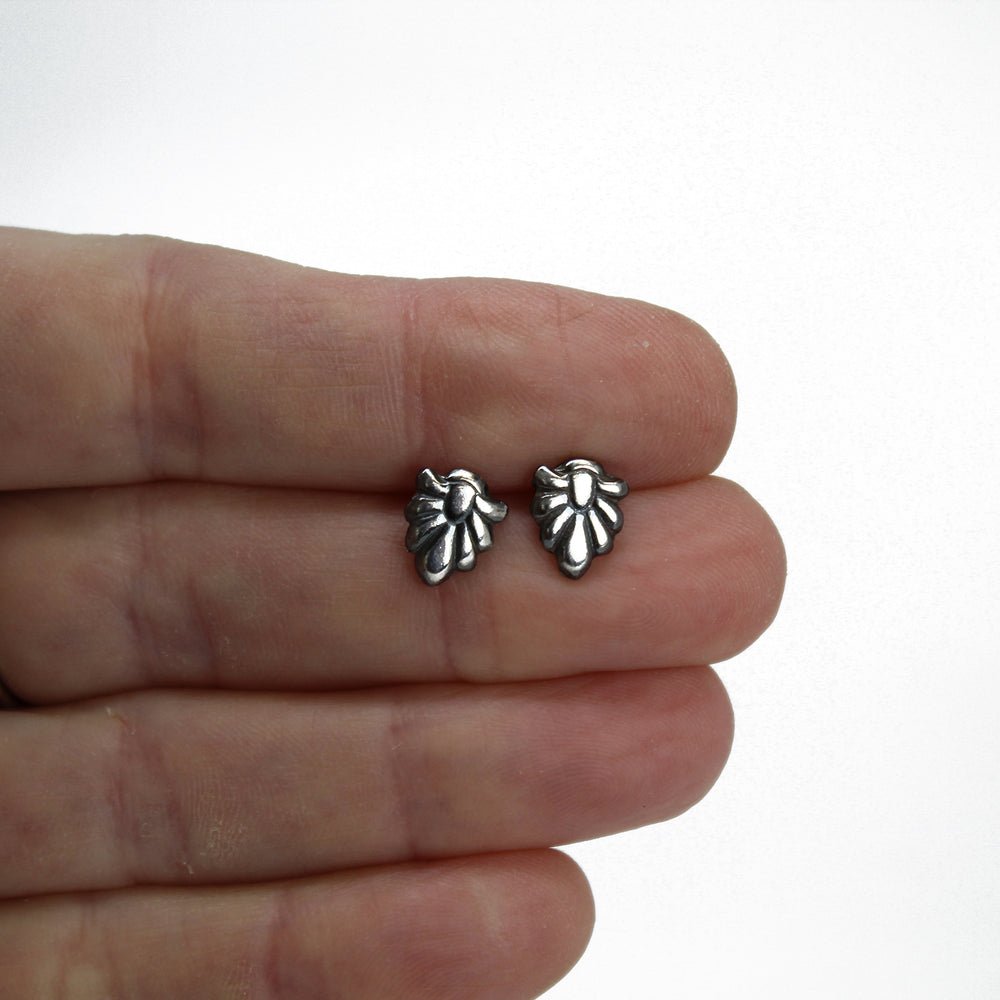 
                      
                        Sterling Silver Flourish Stud Earrings
                      
                    