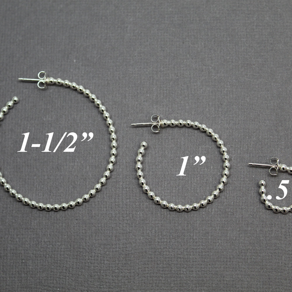 
                      
                        Sterling Silver Ball Wire Hoop Earrings
                      
                    