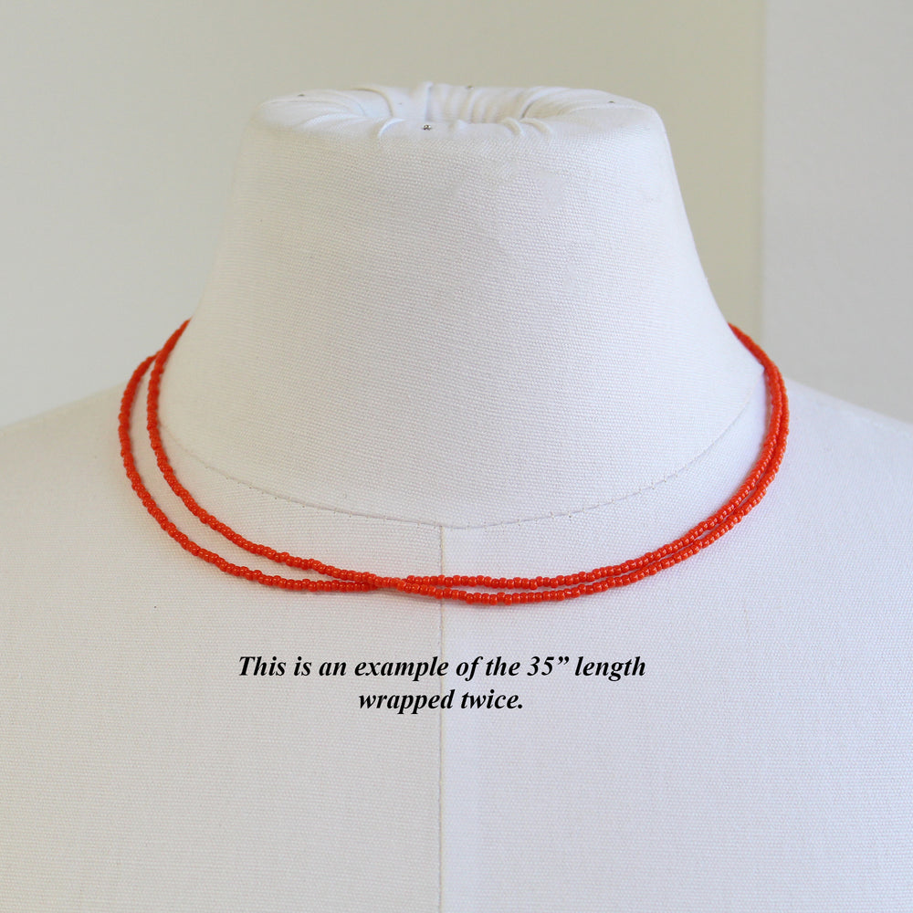 
                      
                        Sunset Orange Seed Bead Necklace, Thin 1.5mm Single Strand
                      
                    