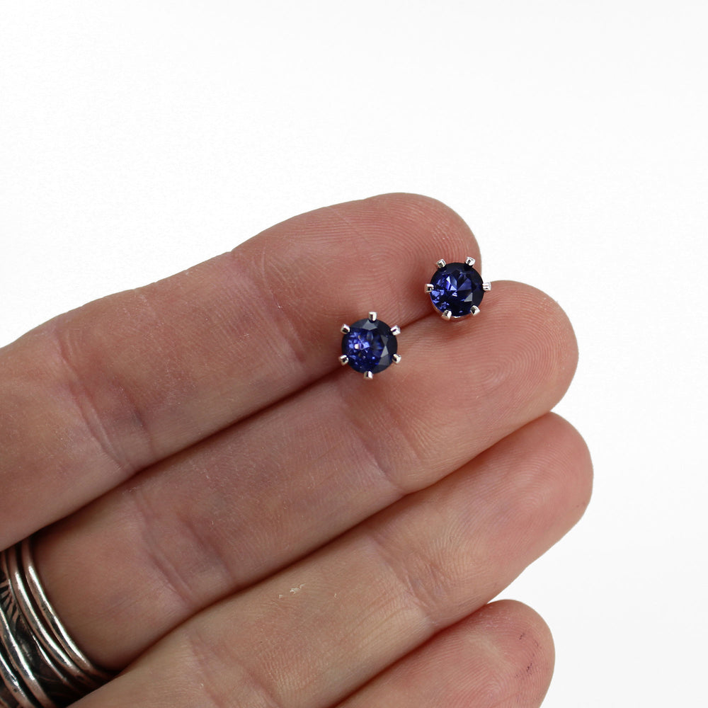 
                      
                        Tanzanite Gemstone Stud Earrings, 6mm Round Prong Set 925 Sterling Silver
                      
                    