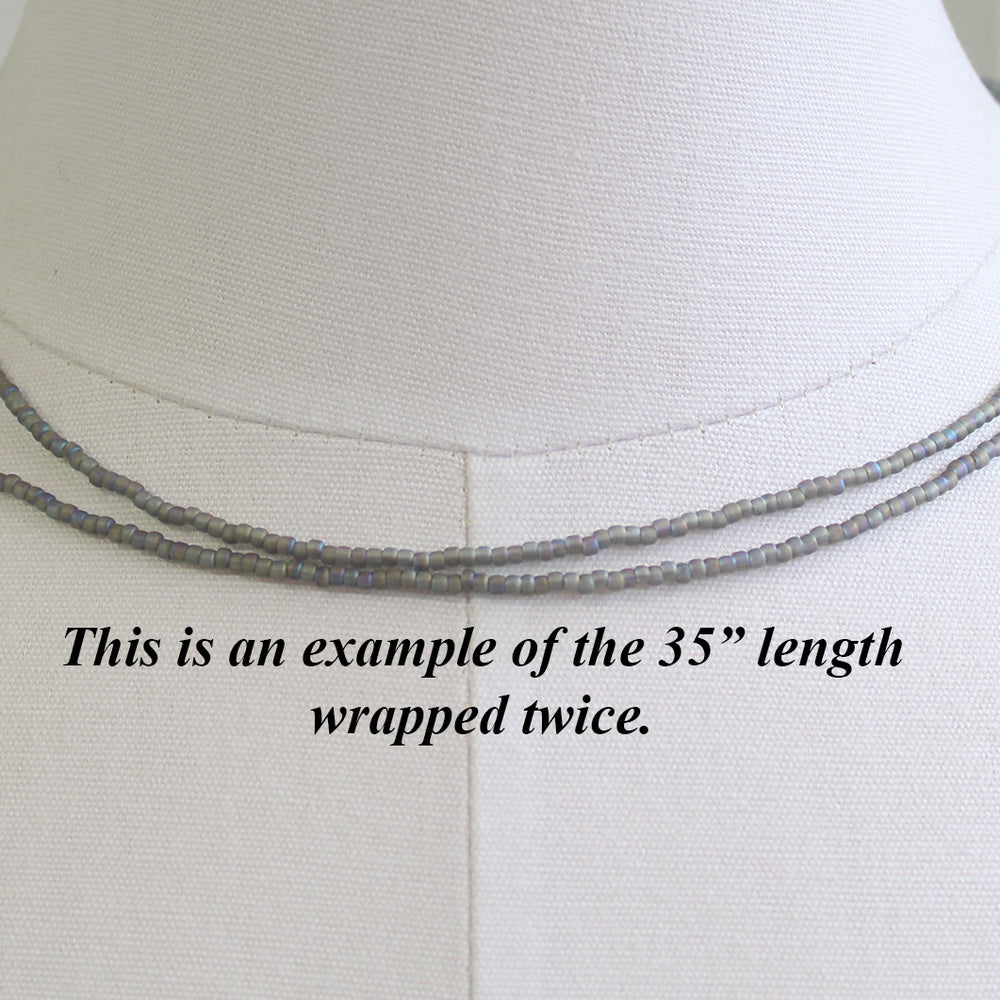 
                      
                        Transparent Rainbow Frosted Grey Seed Bead Necklace, Thin 1.5mm Single Strand
                      
                    