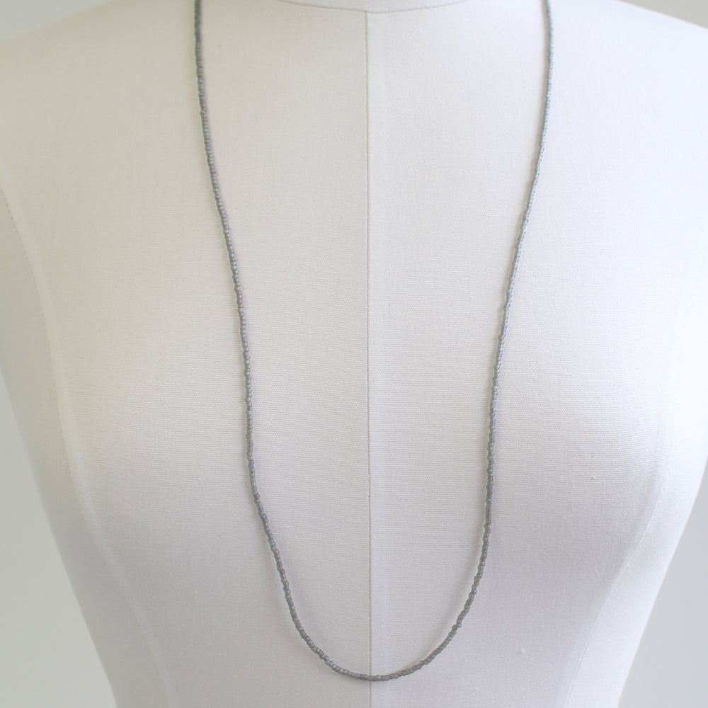 
                      
                        Transparent Rainbow Frosted Grey Seed Bead Necklace, Thin 1.5mm Single Strand
                      
                    