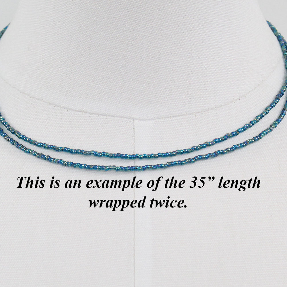 
                      
                        Transparent Rainbow Teal Seed Bead Necklace, Thin 1.5mm Single Strand
                      
                    