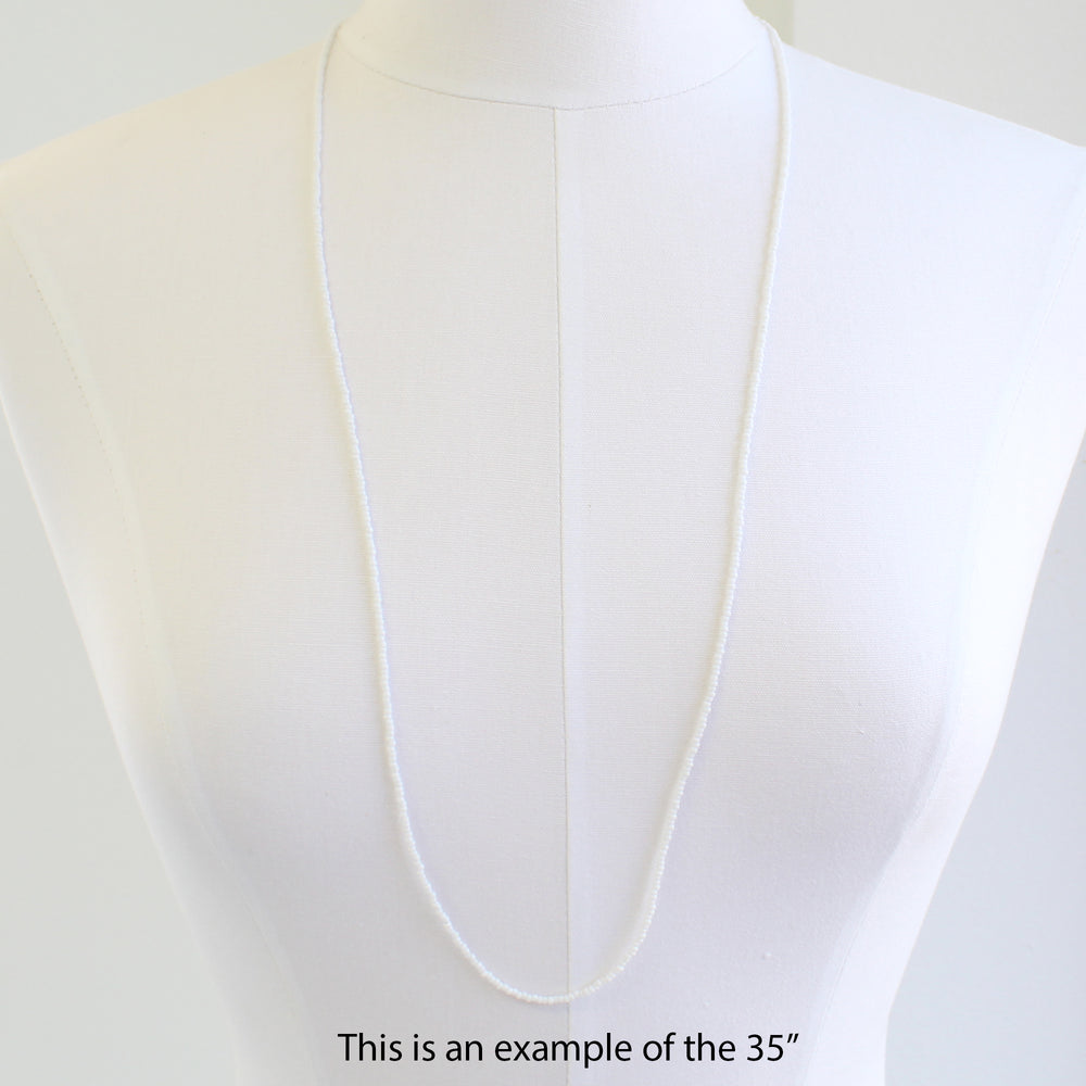 
                      
                        White Seed Bead Necklace-Shiny Opaque White-Single Strand
                      
                    