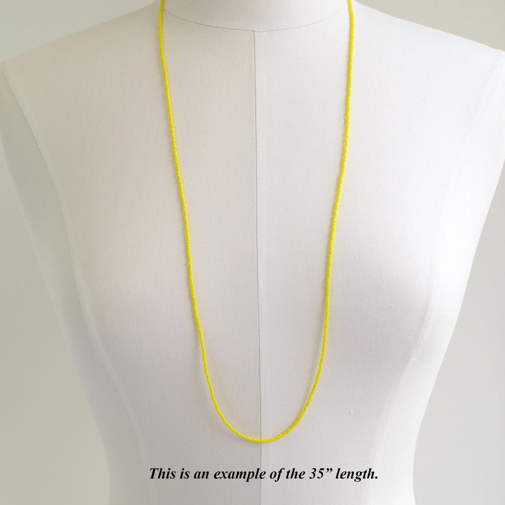
                      
                        Yellow Single Strand Seed Bead Necklace, Tiny 2.2mm Opaque Dandelion Yellow Beaded Necklace, Made to Order Choker to Long Lengths
                      
                    