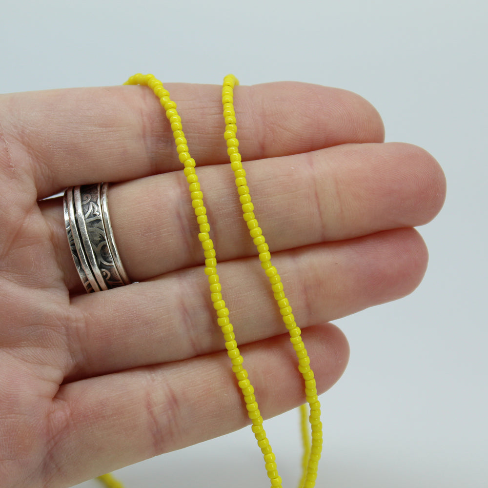 
                      
                        Yellow Single Strand Seed Bead Necklace, Tiny 2.2mm Opaque Dandelion Yellow Beaded Necklace, Made to Order Choker to Long Lengths
                      
                    