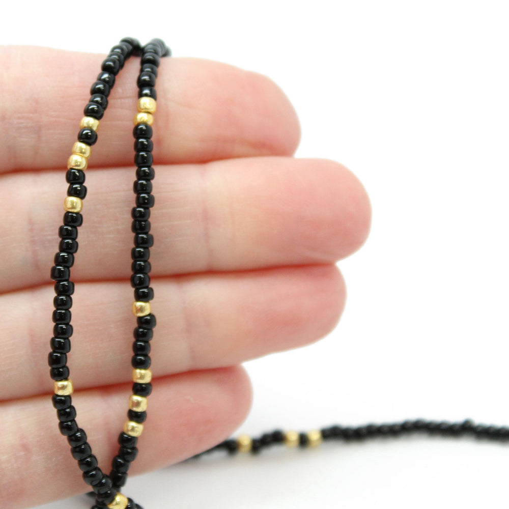 
                      
                        Handmade Black and Gold Seed Bead Necklace
                      
                    