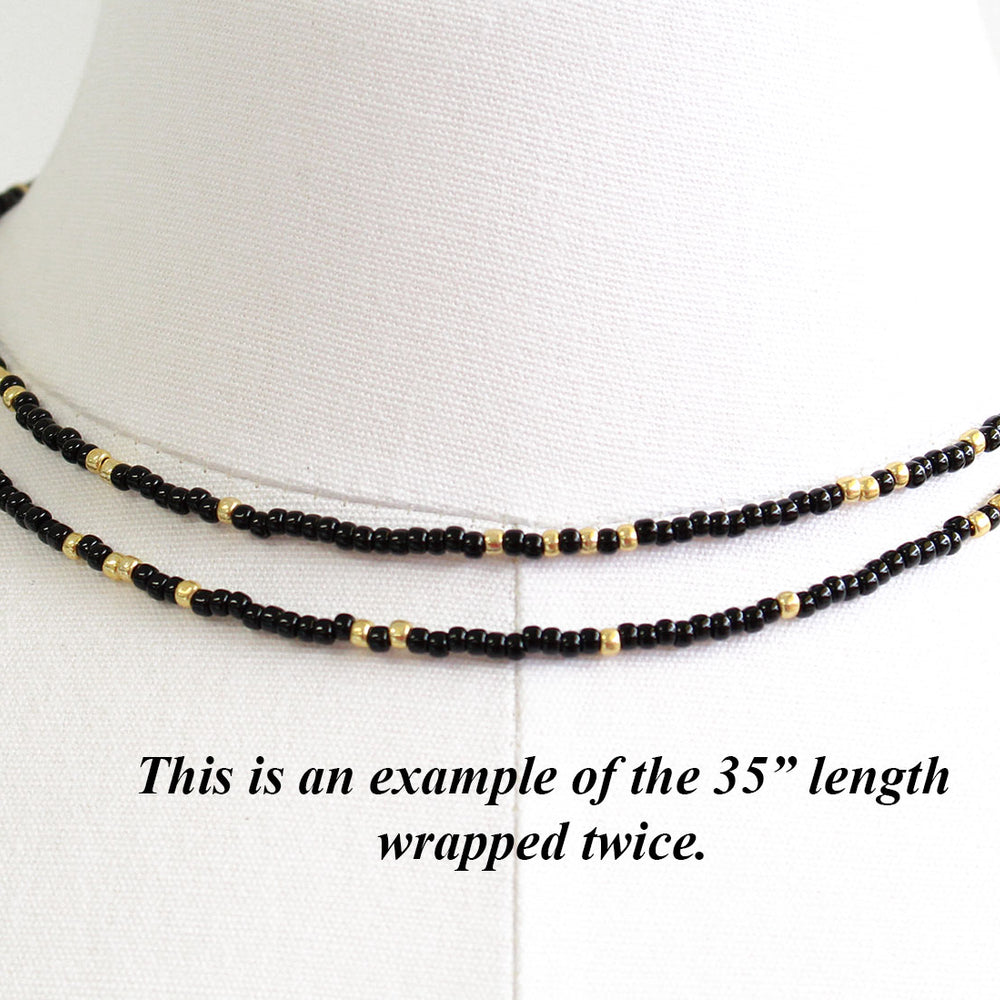 
                      
                        Black and Gold Seed Bead Necklace
                      
                    