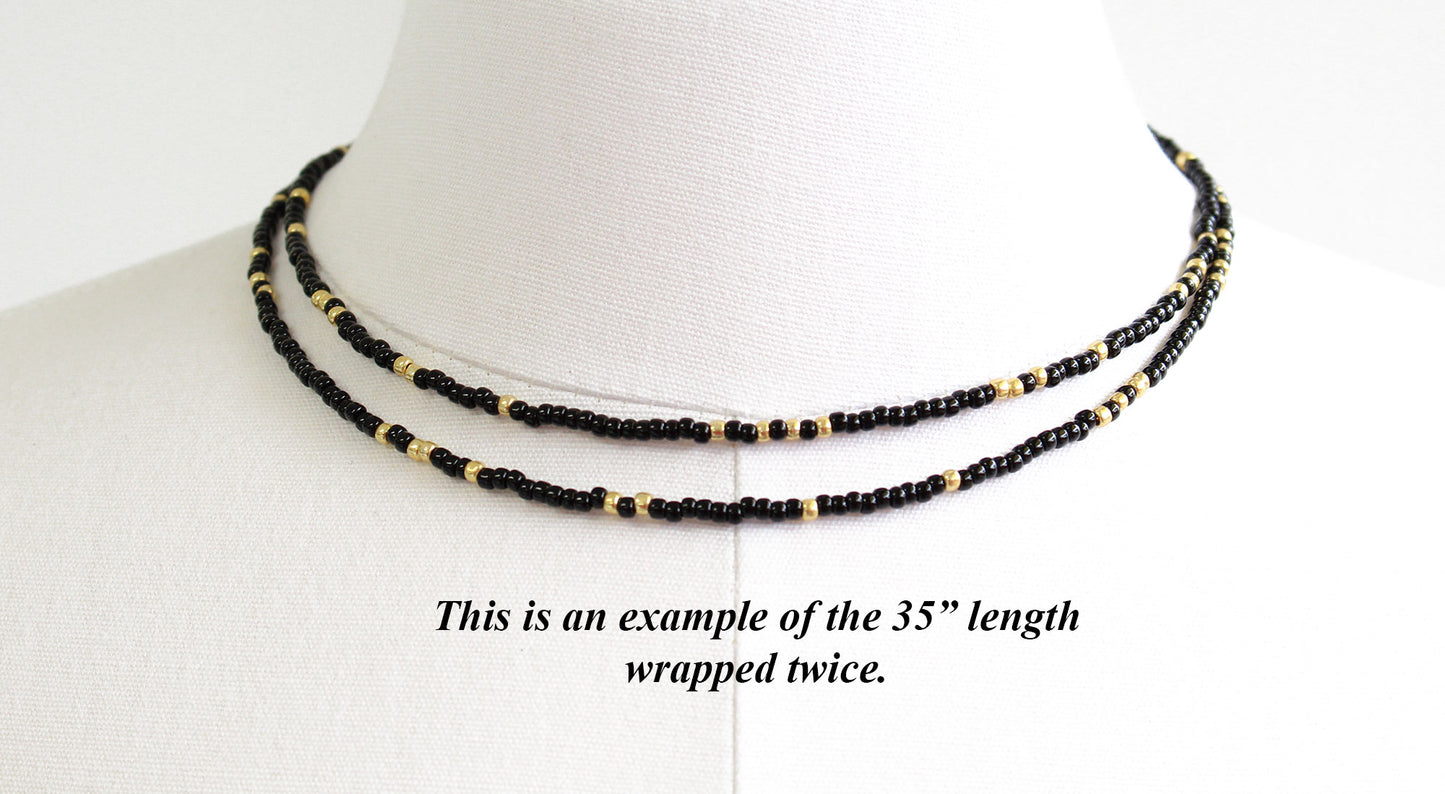 Load image into Gallery viewer, Black and Gold Seed Bead Necklace
