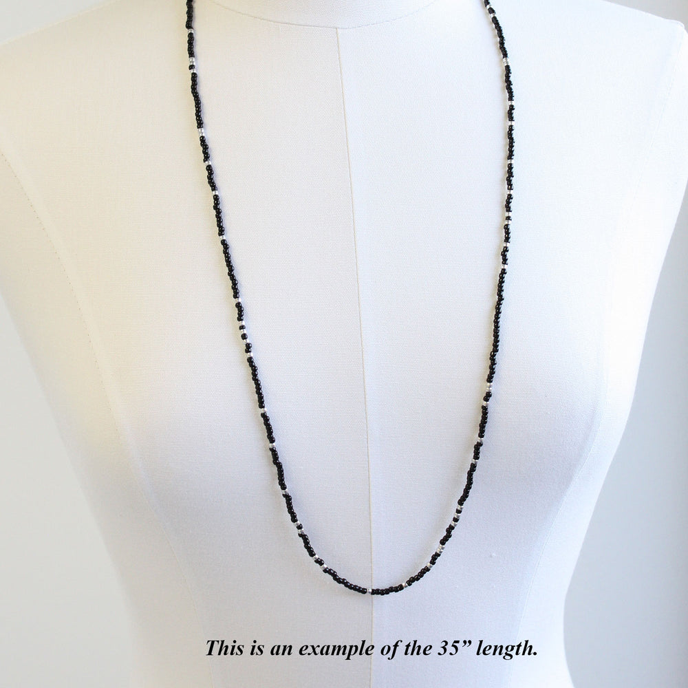 
                      
                        35" Black and Silver Seed Bead Necklace
                      
                    