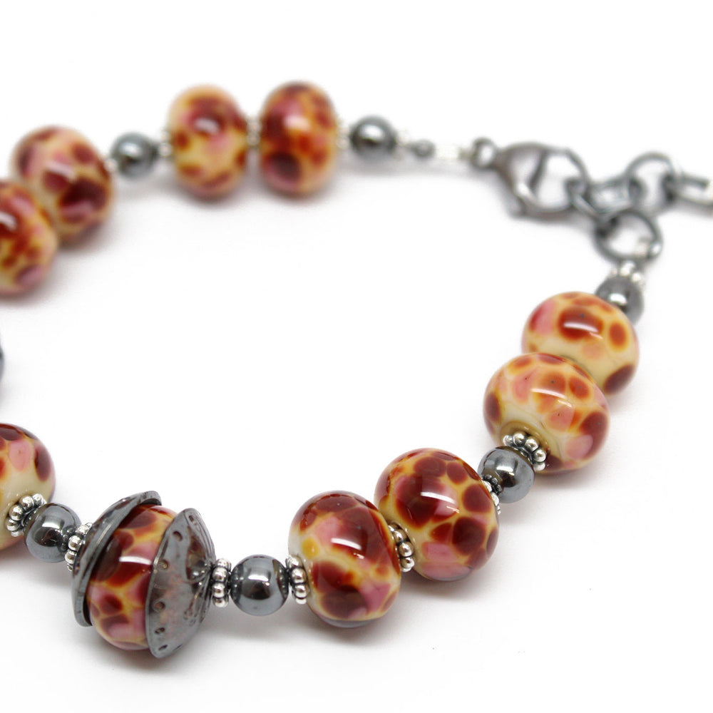 
                      
                        Handmade Burgundy Lampwork Bracelet in Sterling Silver
                      
                    