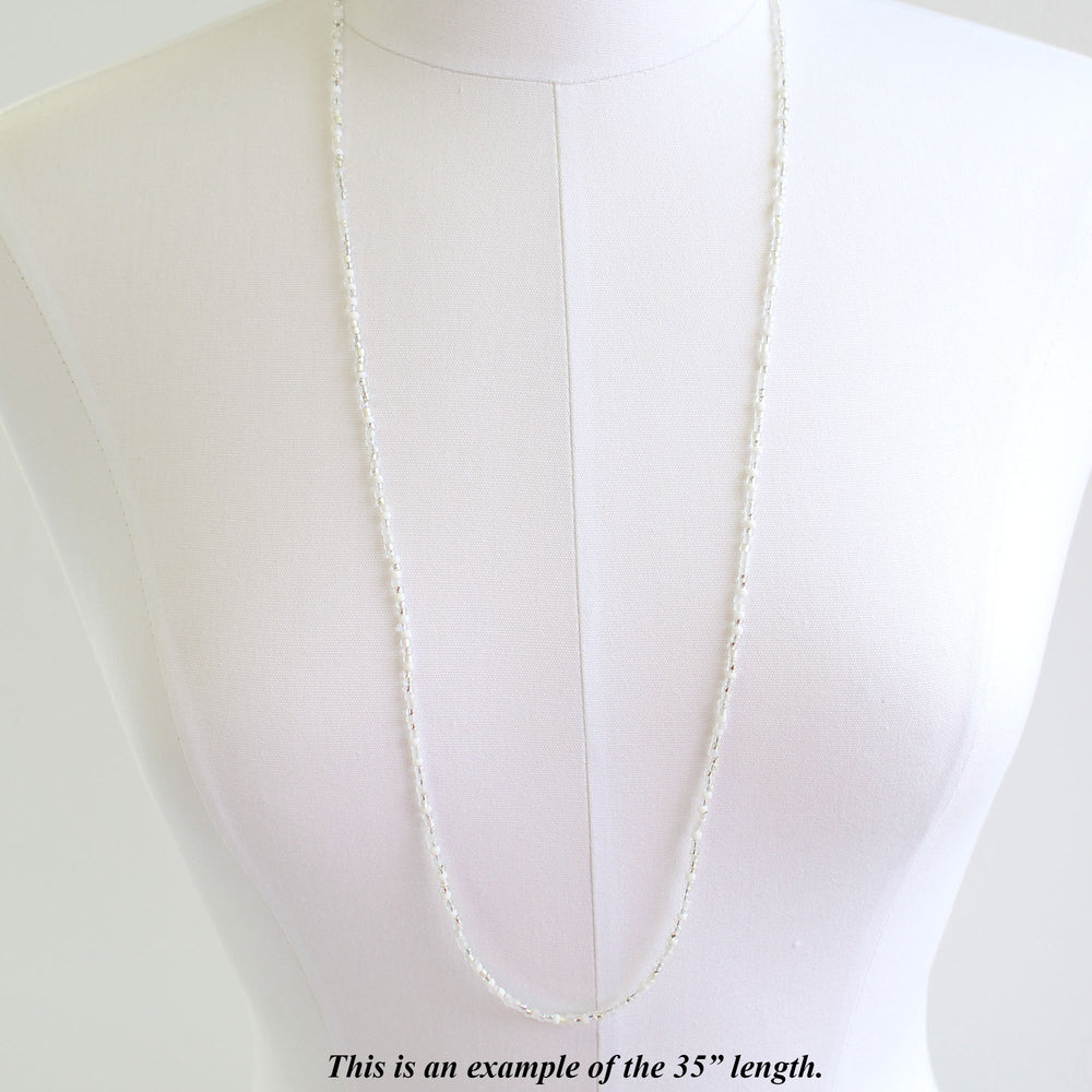 
                      
                        long White Seed Bead Necklace-Classic Wedding White-Single Strand
                      
                    