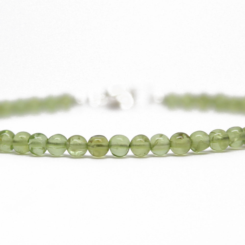 
                      
                        Peridot Bracelet with Lobster Clasp, Small 4mm Beads
                      
                    